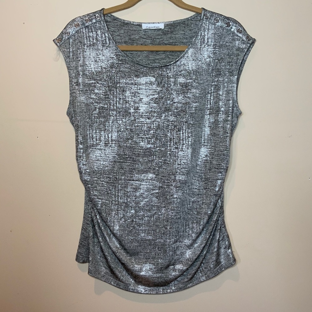 Reflective silver draped top